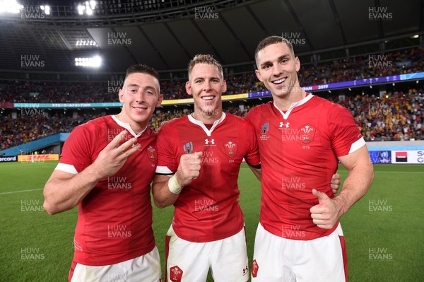 290919 - Australia v Wales - Rugby World Cup - Josh Adams, Liam Williams and George North of Wales celebrate at the end of the game