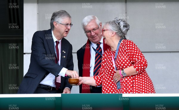 290919 - Australia v Wales - Rugby World Cup - First Minister Mark Drakeford, Dennis Gethin and Janet Gethin