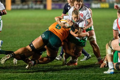 010825 - Australia Women v Wales Women - Keira Bevan of Wales is tackled