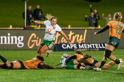 010825 - Australia Women v Wales Women - Courtney Keight of Wales celebrates as Jasmine Joyce of Wales crashes over to score try