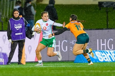 010825 - Australia Women v Wales Women - Jasmine Joyce of Wales looks to hold off Desiree Miller of Australia