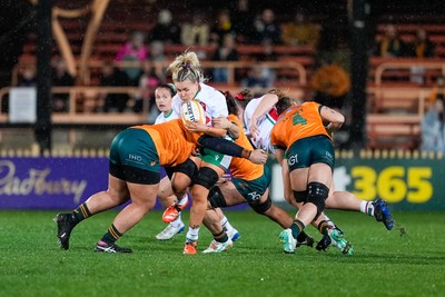 010825 - Australia Women v Wales Women - Alex Callender of Wales is tackled
