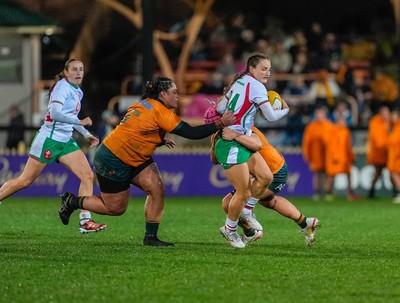 010825 - Australia Women v Wales Women -  Jasmine Joyce of Wales is tackled