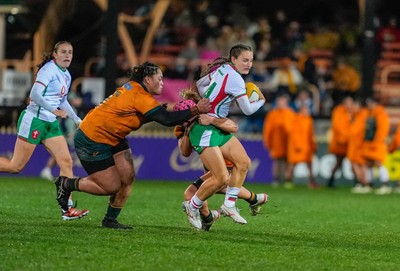 010825 - Australia Women v Wales Women - Jasmine Joyce of Wales is tackled