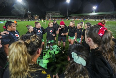 010825 - Australia Women v Wales Women - Dan Murphy, Wales Women defence coach speaks to the players during warm up
