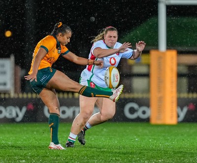010825 - Australia Women v Wales Women - Gwenllian Pyrs of Wales looks to charge down a kick
