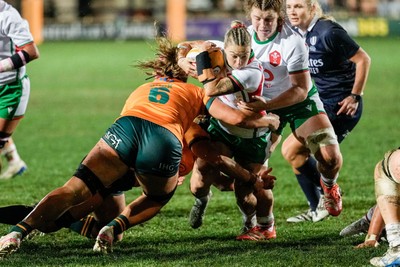 010825 - Australia Women v Wales Women - Keira Bevan of Wales is tackled short of the line