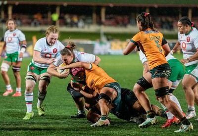 010825 - Australia Women v Wales Women - Gwenllian Pyrs of Wales is tackled short of the line