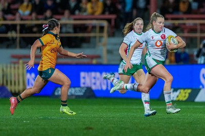 010825 - Australia Women v Wales Women - Carys Cox of Wales breaks away