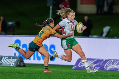 010825 - Australia Women v Wales Women - Carys Cox of Wales attacks