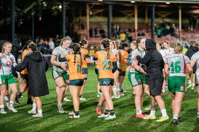 010825 - Australia Women v Wales Women - Players shake  hands at the end of the match