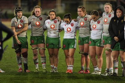 010825 - Australia Women v Wales Women - Wales players, Bethan Lewis, Abbie Fleming, Kayleigh Powell, Meg Davies, Georgia Evans, Jenni Scoble, Alaw Pyrs and Carys Phillips of Wales at the end of the match