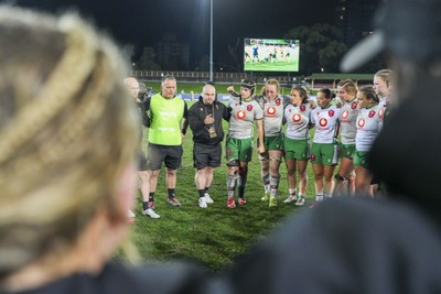 010825 - Australia Women v Wales Women - Sean Lynn, Wales Women head coach, speaks to the players as the Wales team huddle up at the end of the match