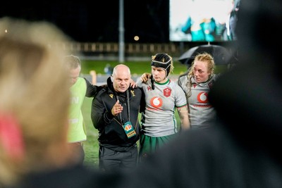 010825 - Australia Women v Wales Women - Sean Lynn, Wales Women head coach, speaks to the players as the Wales team huddle up at the end of the match