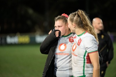 010825 - Australia Women v Wales Women - Gwenllian Pyrs of Wales and Carys Cox of Wales at the end of the match
