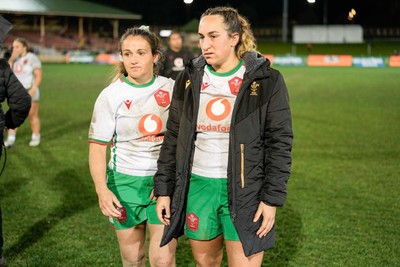 010825 - Australia Women v Wales Women - Kayleigh Powell of Wales and Courtney Keight of Wales at the end of the match