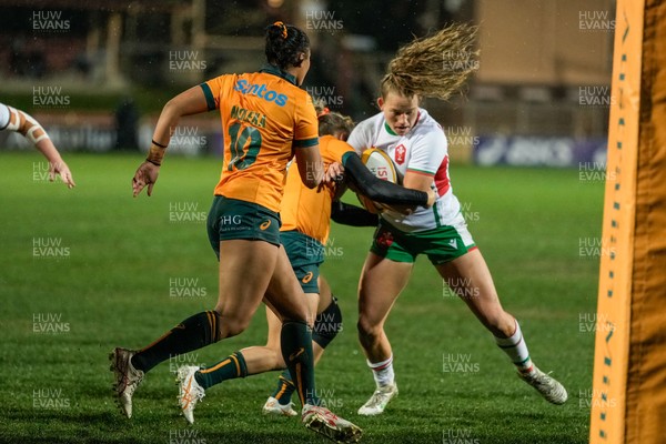 010825 - Australia Women v Wales Women - Carys Cox of Wales is tackled