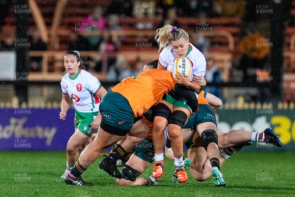 010825 - Australia Women v Wales Women - Alex Callender of Wales is tackled