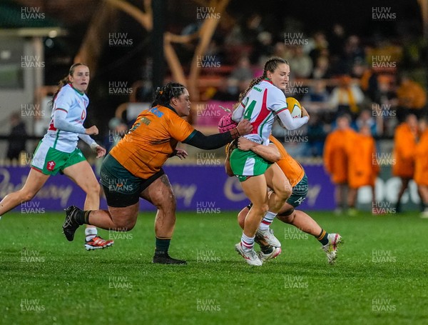 010825 - Australia Women v Wales Women -  Jasmine Joyce of Wales is tackled