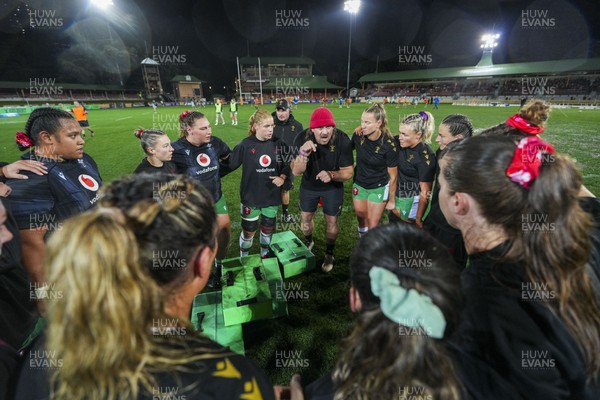 010825 - Australia Women v Wales Women - Dan Murphy, Wales Women defence coach speaks to the players during warm up