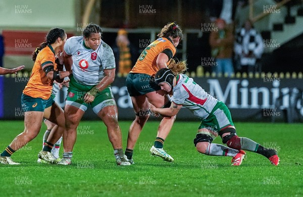 010825 - Australia Women v Wales Women - Bethan Lewis of Wales puts in a tackle