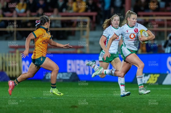 010825 - Australia Women v Wales Women - Carys Cox of Wales breaks away