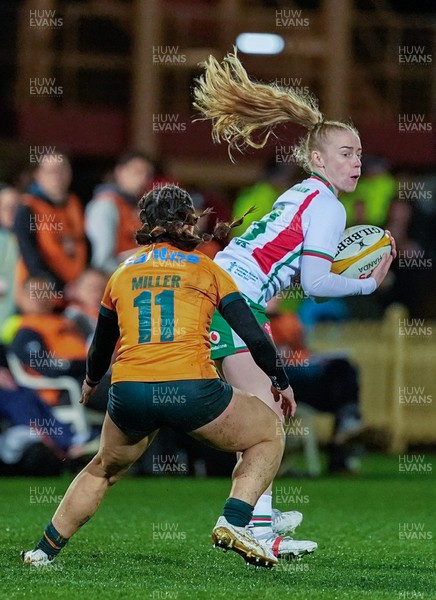 010825 - Australia Women v Wales Women - Catherine Richards of Wales claims the ball