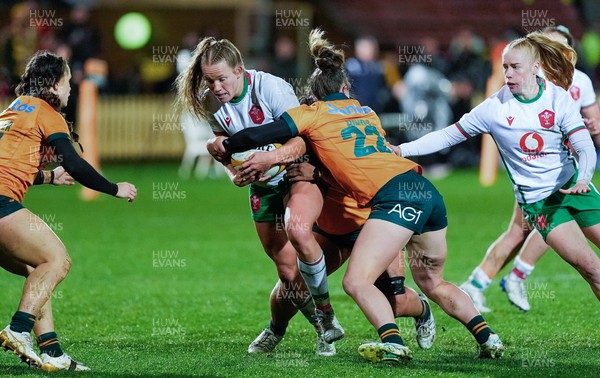 010825 - Australia Women v Wales Women - Carys Cox of Wales is tackled short of the line