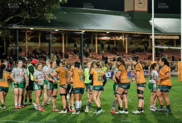 010825 - Australia Women v Wales Women - Players shake  hands at the end of the match