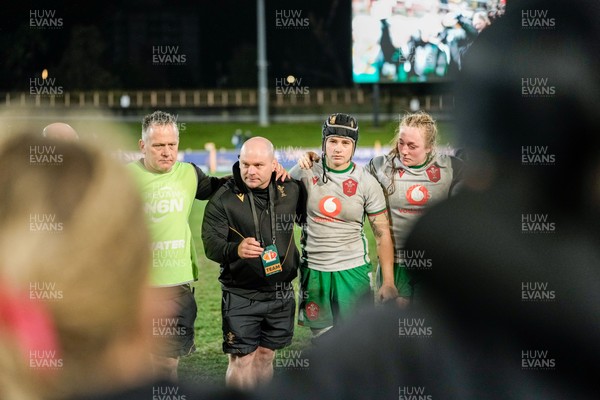 010825 - Australia Women v Wales Women - Sean Lynn, Wales Women head coach, speaks to the players as the Wales team huddle up at the end of the match