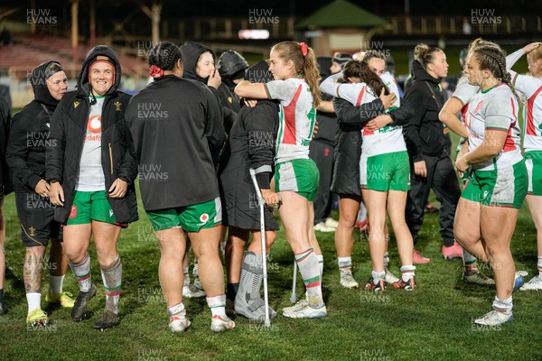 010825 - Australia Women v Wales Women - Wales players embrace each other at the end of the match