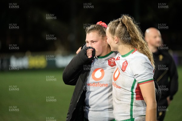 010825 - Australia Women v Wales Women - Gwenllian Pyrs of Wales and Carys Cox of Wales at the end of the match