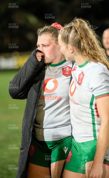 010825 - Australia Women v Wales Women - Gwenllian Pyrs of Wales and Carys Cox of Wales at the end of the match