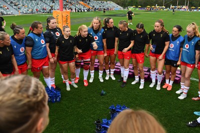 260725 - Australia Women v Wales Women - The Wales team huddle up at the start of the match