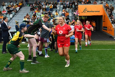 260725 - Australia Women v Wales Women - Kelsey Jones of Wales leads the team out on her 50th cap