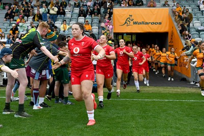 260725 - Australia Women v Wales Women - Maisie Davies of Wales runs out at the start of the match