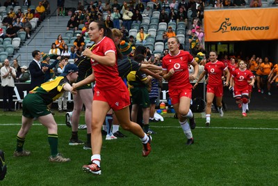 260725 - Australia Women v Wales Women - Nel Metcalfe of Wales and Hannah Dallavalle of Wales run out at the start of the match
