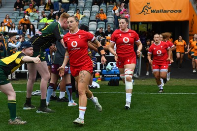 260725 - Australia Women v Wales Women - Keira Bevan of Wales and Gwen Crabb of Wales run out at the start of the match