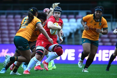 260725 - Australia Women v Wales Women - Bethan Lewis of Wales charges forward