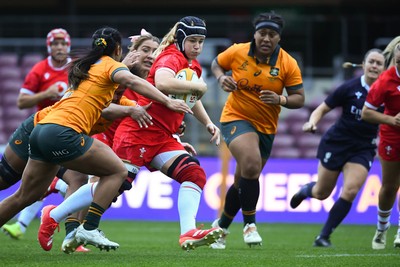 260725 - Australia Women v Wales Women - Bethan Lewis of Wales charges forward