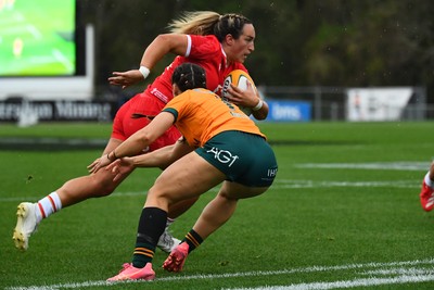 260725 - Australia Women v Wales Women - Courtney Keight of Wales charges forward