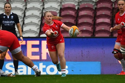 260725 - Australia Women v Wales Women - Seren Lockwood of Wales feed the ball out