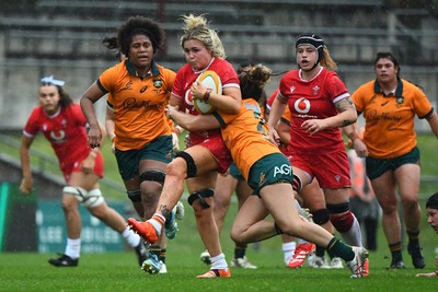 260725 - Australia Women v Wales Women - Alex Callender of Wales is held