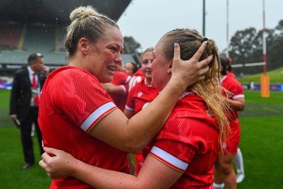 260725 - Australia Women v Wales Women - Kelsey Jones of Wales and Seren Lockwood of Wales celebrate at the end of the match