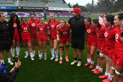 260725 - Australia Women v Wales Women - Alex Callender of Wales speaks to the players at the end of the match