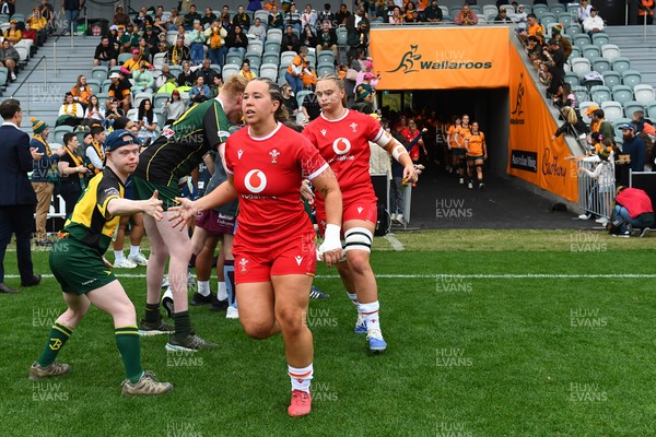 260725 - Australia Women v Wales Women - Katherine Baverstock of Wales and Tilly Vucaj of Wales run out