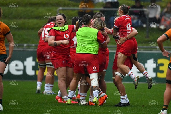 260725 - Australia Women v Wales Women - Wales players celebrate on the final whistle