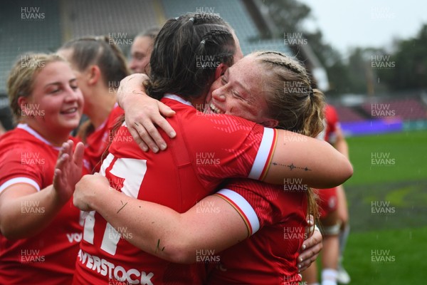 260725 - Australia Women v Wales Women - Seren Lockwood of Wales and Katherine Baverstock of Wales celebrate at the end of the match