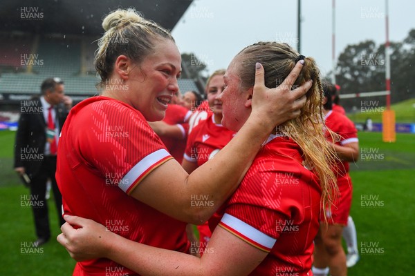 260725 - Australia Women v Wales Women - Kelsey Jones of Wales and Seren Lockwood of Wales celebrate at the end of the match