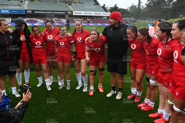 260725 - Australia Women v Wales Women - Alex Callender of Wales speaks to the players at the end of the match